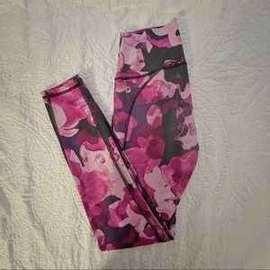 Pink, purple, and black high waisted fabletics leggings